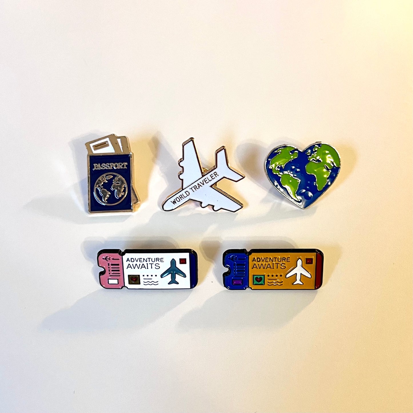 Travel themed pin badges